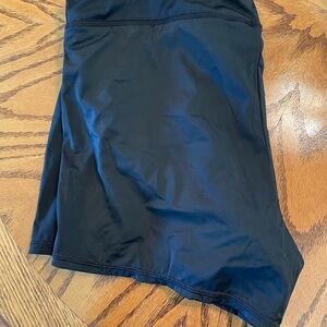 Black swim shorts. Built in panties.